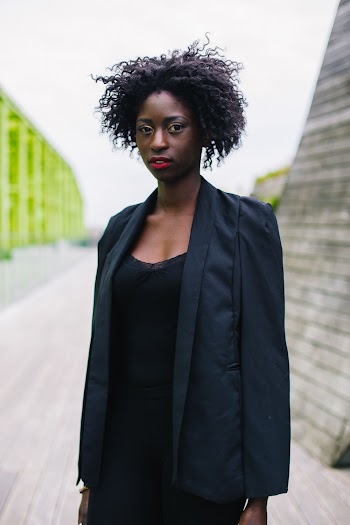 Woman Standing Wearing Blazer