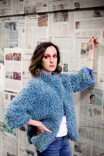 Woman Standing Wearing Blue Fur Coat