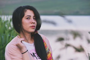 Woman Standing Wearing Pink Crew-neck T-shirt