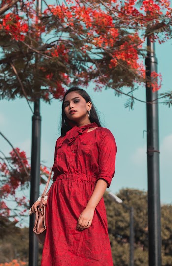 Woman Standing Wearing Red Dress