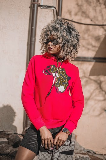 Woman Standing Wearing Red Hoodie