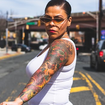 Woman Standing Wearing White Tank Top