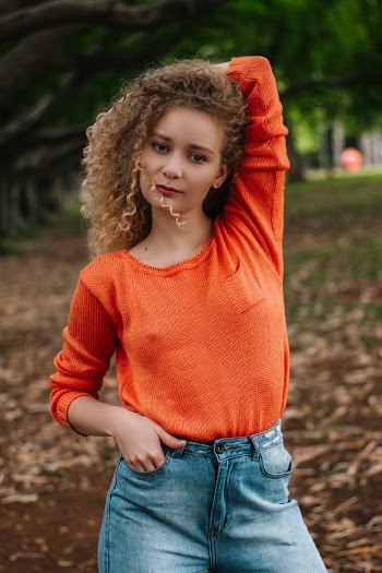 Woman Standing While Posing