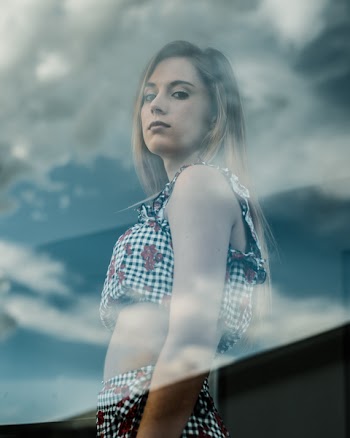 Woman Standing While Posing