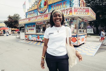 Woman Stands Near Diner