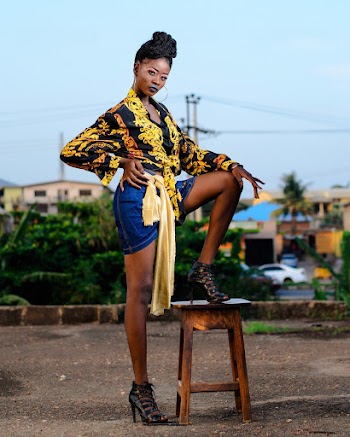 Woman Stepping on Brown Wooden Stool