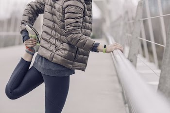 Woman Stretching Before Run