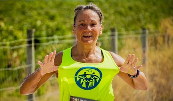 Woman Stretching Out Her Green Tank Top