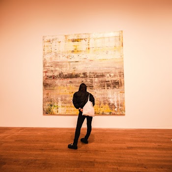 Woman Studying a Painting