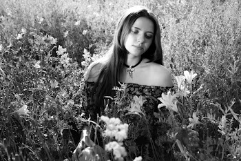 Woman Surrounded by Flowers