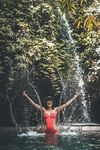 Woman Swim On Body Of Water
