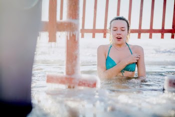 Woman Swimming in Water