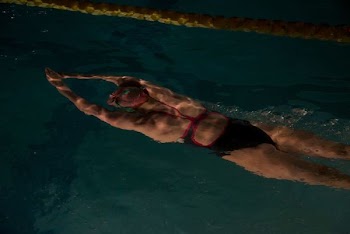 woman swimming on pool