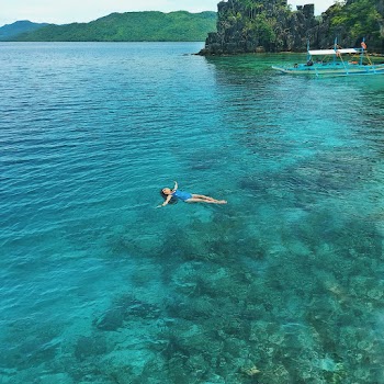 Woman Swimming on Sea