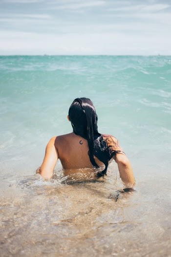 Woman Swims In Ocean