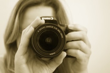 Woman Taking a Picture Using Canon Dslr
