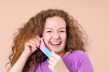 Woman taking mask off mockup during the new… | Free stock photo | High Resolution image