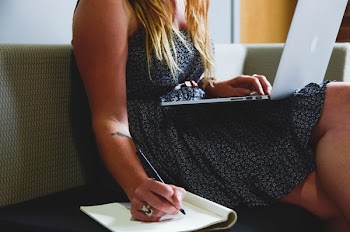          Woman Taking Notes Free Photo     