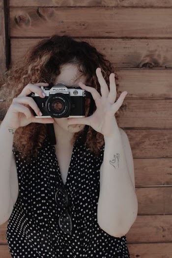 woman taking photo