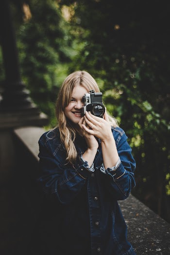 Woman Taking Photo Using Dslr