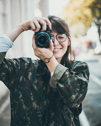 Woman Taking Photo Using Dslr Camera