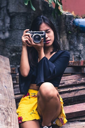 Woman Taking Photo Using Dslr Camera