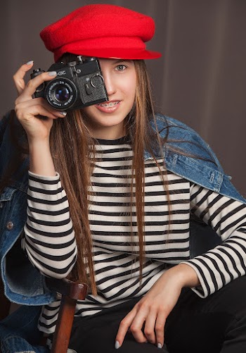 Woman Taking Picture Using Slr Camera
