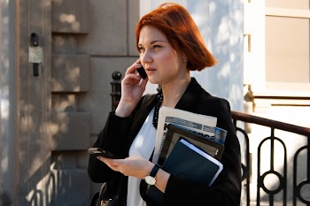 Woman Talking to Her Phone