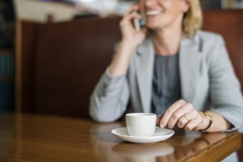 Woman Talking to Phone White Drinking Coffee