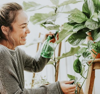 Woman tending and caring for her | Free Photo - rawpixel