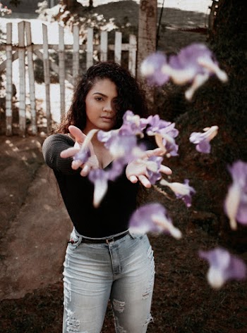 Woman Throwing Flowers
