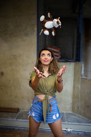 Woman Throwing Plush Toy