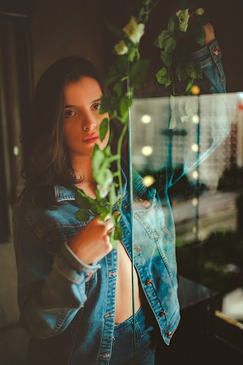 Woman Touching Green Plant