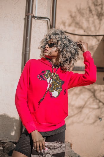 Woman Touching Her Curly Hair