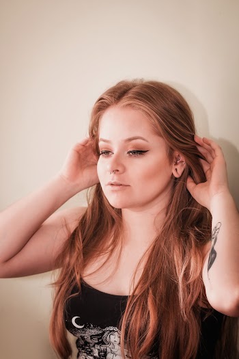 Woman Touching Her Hair