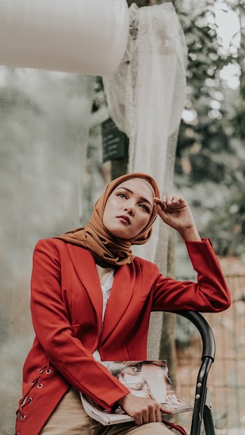 Woman Touching Her Head