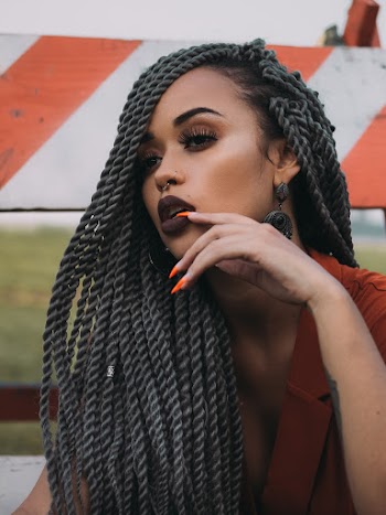 Woman Touching Her Lips