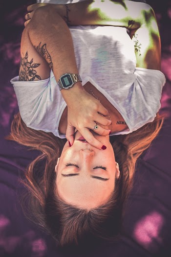 Woman Touching Her Mouth