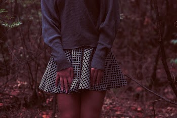 Woman Touching Her Skirt