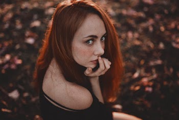 Woman Touching Lips