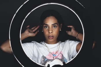 Woman Touching Own Hair
