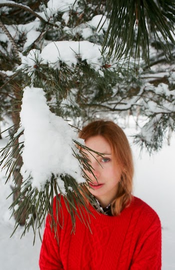 Woman Under Pine Tree With Snow