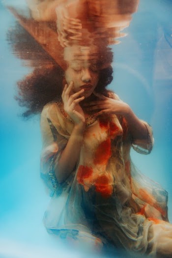 Woman Under the Water Wearing Floral Dress · Free Stock Photo