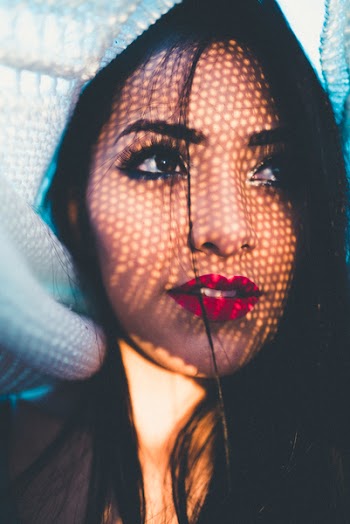 Woman Under White Cover