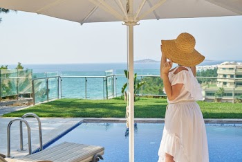 Woman Under White Parasol