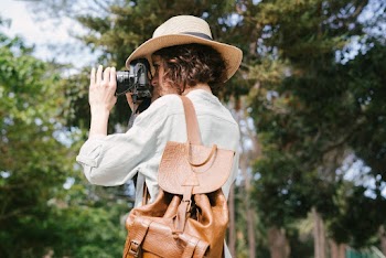 Woman Using a Digital Camera