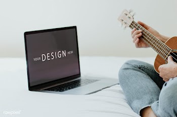 Woman using a laptop screen mockup while playing ukulele during quaran.. | Free  psd mockup - 2328127