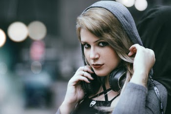 Woman Using Black Headphones