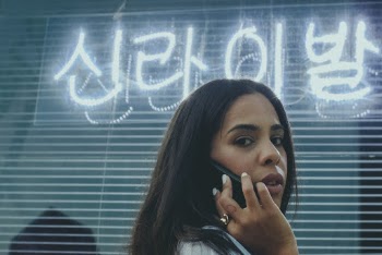 Woman Using Black Smartphone