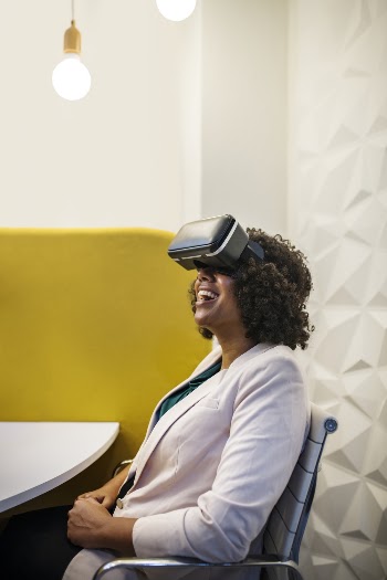 Woman Using Black Vr Headset